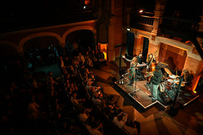 Hidden Jazz Club playing in a concert hall