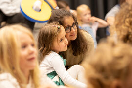 Mother and her child with their heads resting together