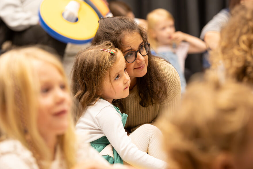 Mother and her child with their heads resting together