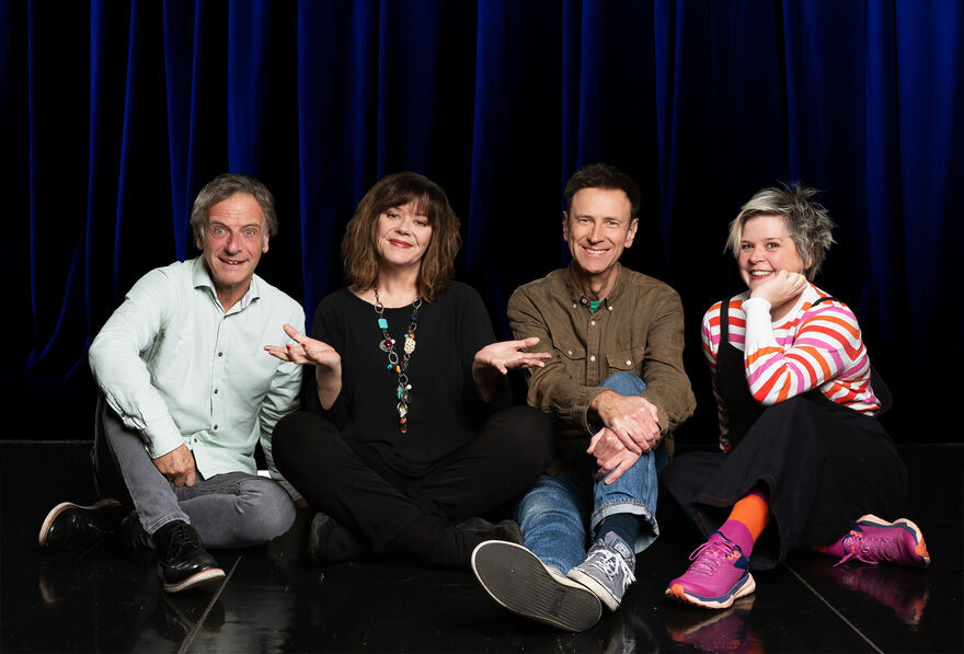 Comedy Store Players line-up sat on the floor