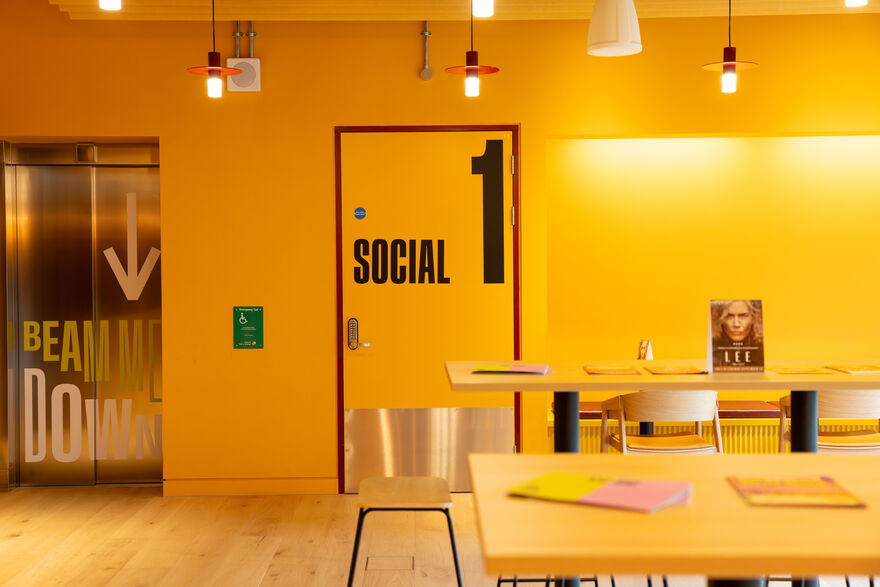Yellow wall with door in the middle
