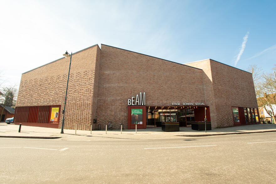Exterior of BEAM (Venue). Brick walls on a sunny day.